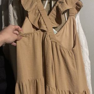 Bought from a local boutique, never been warn!